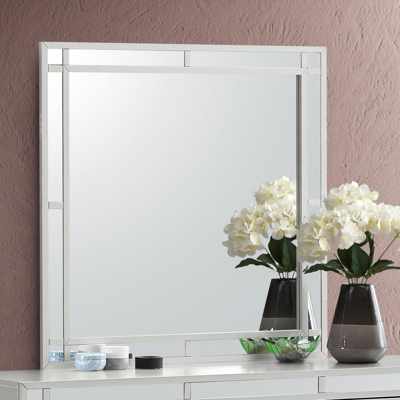 Glory Furniture Madison silver champagne mirror with a sleek rectangular frame, stylish and modern home decor element.