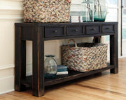 Black Gavelston sofa table by Signature Design Ashley, featuring a sleek rectangular surface and modern design for living room decor.