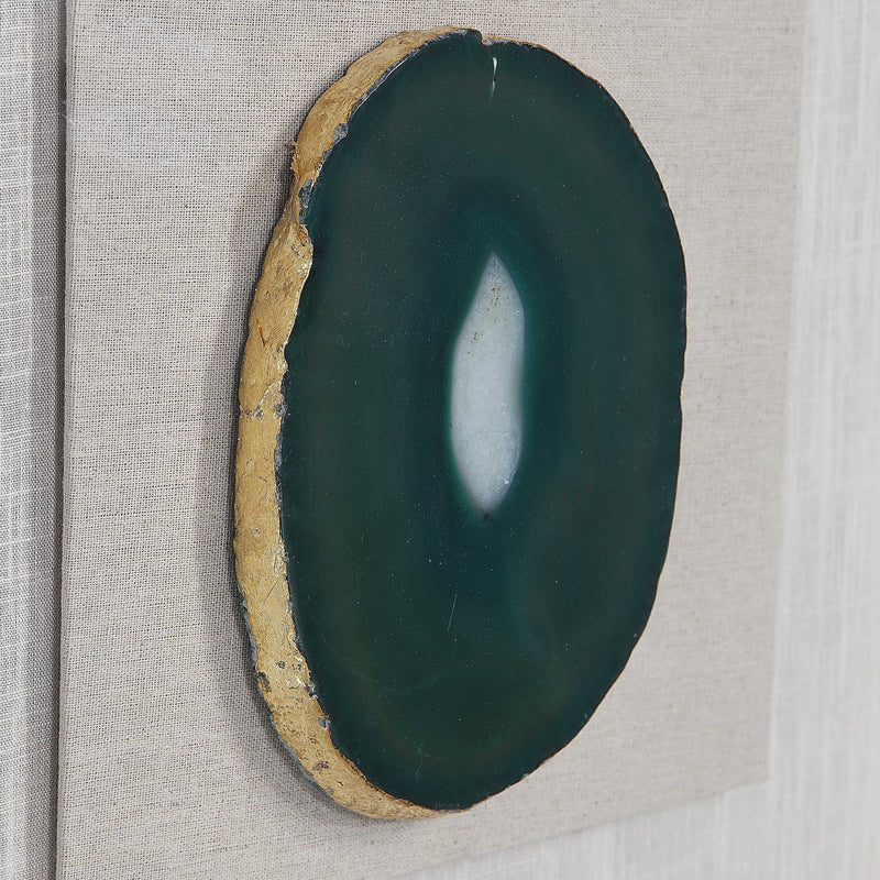 Keeva agate stone shadow box wall decor in gold by Uttermost, featuring a natural agate stone with a sleek gold frame.