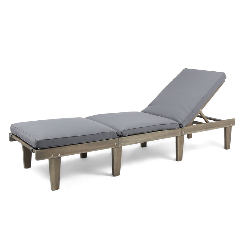 Noble House Ariana wood chaise lounge with cushion, featuring a sleek design and comfortable seating on a modern wooden frame.