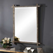 Uttermost Abanu ribbed dressing mirror with sleek vanity design, featuring a modern ribbed frame for stylish reflection.