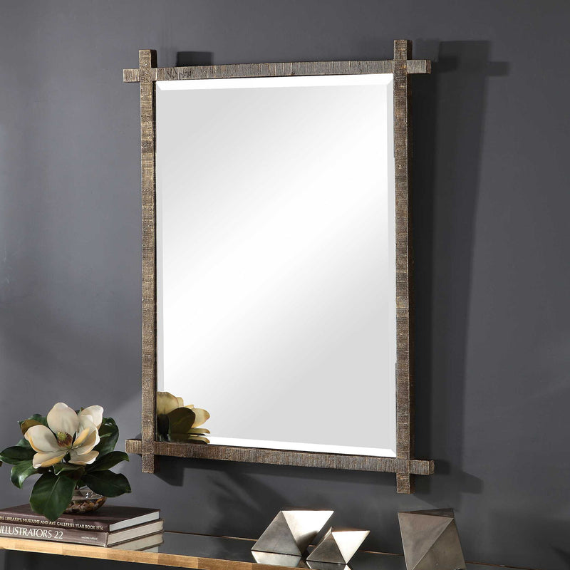 Uttermost Abanu ribbed dressing mirror with sleek vanity design, featuring a modern ribbed frame for stylish reflection.