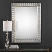 Silver Lanester Leaf Wall Mirror by Uttermost featuring a leaf-shaped frame and reflective glass surface.