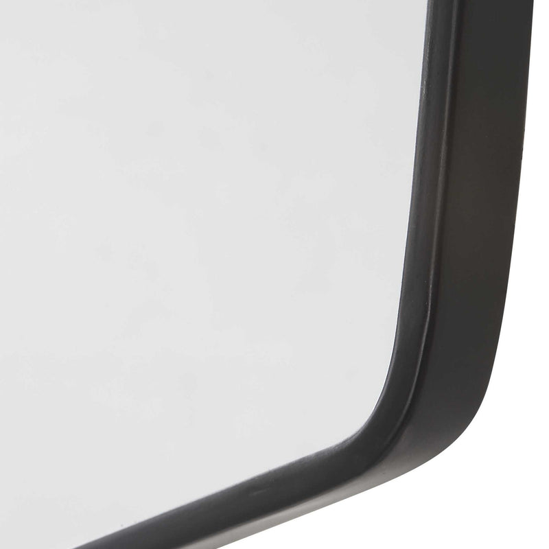 Set of four black wall mirrors from Uttermost's Linneah collection, featuring sleek rectangular frames for modern decor.