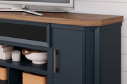Landocken - XL TV Stand W/Fireplace Option - Brown / Blue - R&R Furniture Gallery (Fountain Valley, CA)