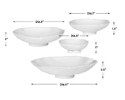 Set of four Uttermost Lucky Coins wall decor bowls with intricate designs, displayed on a neutral wall.