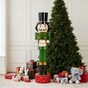 Noble House Christmas nutcracker holiday decor in green and red, featuring a festive holiday figure with detailed attire.