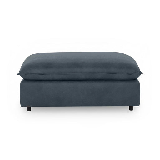 Classic Home Caplan upholstered ottoman with soft fabric and cushioned top, ideal as a versatile living room accent piece.