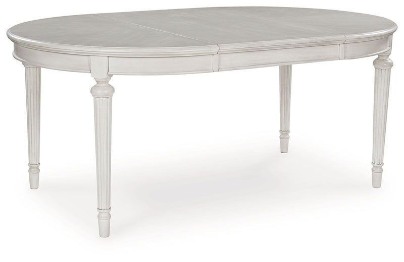 Montelaine - Oval Dining Room Extension Table - Antique White - R&R Furniture Gallery (Fountain Valley, CA)