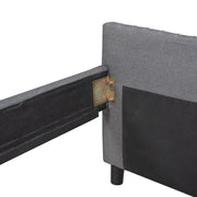 DreamHaus upholstered storage daybed with wood slat support and two drawers, featuring a soft, cushioned fabric design.
