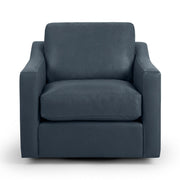Classic Home Aspen swivel chair with plush fabric upholstery and a modern design, shown from a side angle.