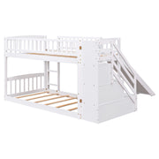 DreamHaus twin over twin stairway bunk bed with built-in drawers and slide, featuring a sturdy wooden frame and safety rails.