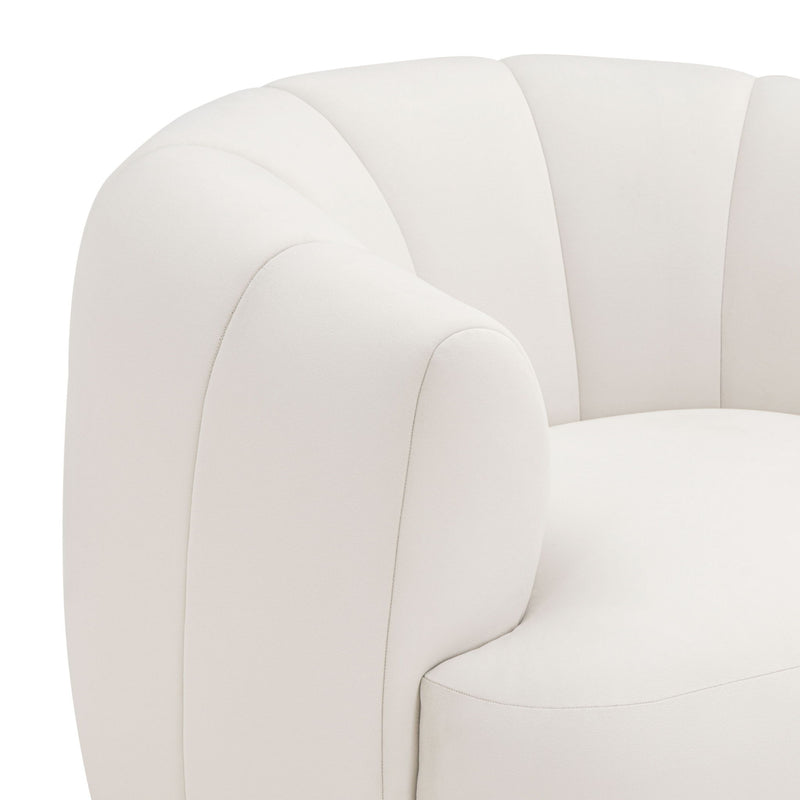 TOV Furniture Jasmine swivel accent chair with plush upholstery and modern design, shown in a cozy living room setting.