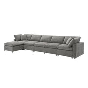 Modern Luxe & Co. cloud sectional sofa bed with six seats, ottoman, and convertible U-shape sleeper for living room comfort.