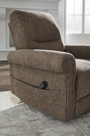 Signature Design by Ashley Aureta Power Lift Recliner in plush fabric, showing the comfortable, adjustable lift chair with remote control.