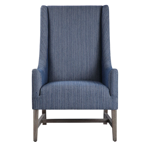 Blue Galiot Wingback Accent Chair by Uttermost with curved arms and tufted upholstery, stylish and comfortable for living rooms.