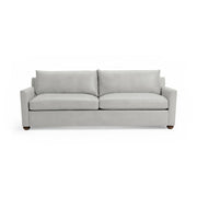 Olivia stationary sofa by Classic Home featuring plush cushions, neutral upholstery, and a modern design for living room comfort.