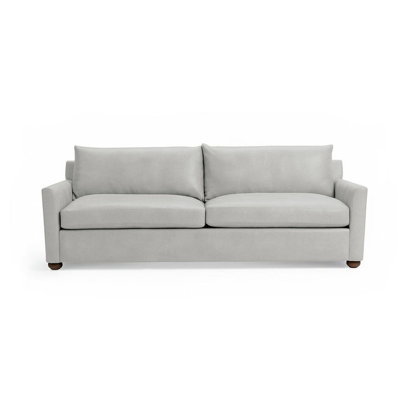 Olivia stationary sofa by Classic Home featuring plush cushions, neutral upholstery, and a modern design for living room comfort.