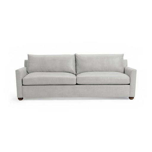 Olivia stationary sofa by Classic Home featuring plush cushions, neutral upholstery, and a modern design for living room comfort.