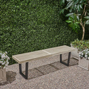 Noble House Intrinsic outdoor dining bench with slat top, sturdy wooden construction, ideal for patio or garden seating.