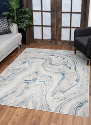 Elegance - 5'3" X 7'3" Polyester Area Rug - Ivory - R&R Furniture Gallery (Fountain Valley, CA)