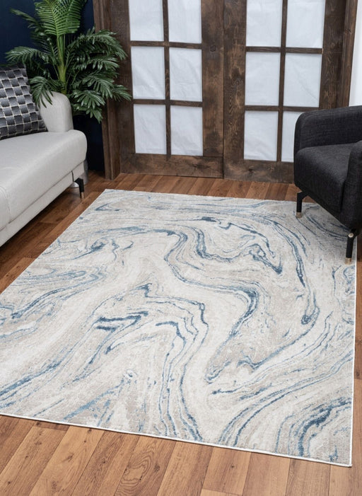 Elegance - 5'3" X 7'3" Polyester Area Rug - Ivory - R&R Furniture Gallery (Fountain Valley, CA)