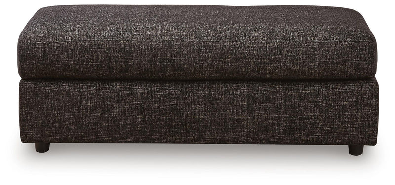 Black oversized accent ottoman from Signature Design by Ashley® Lentiz collection, with plush fabric and modern design.