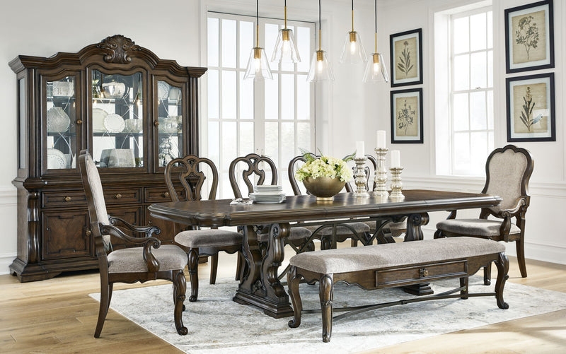 Maylee 11-piece dark brown dining set with extension table, 4 side chairs, 2 arm chairs, storage bench, buffet, and hutch.