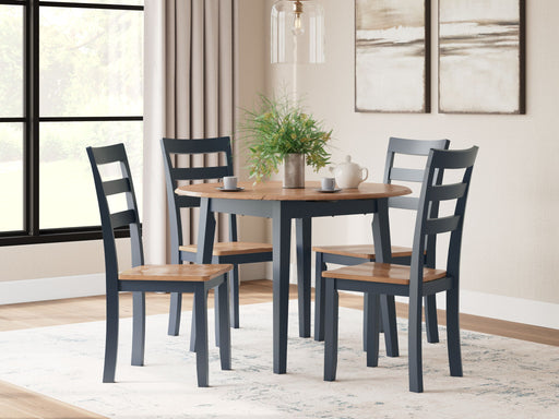 Round Drop Leaf Dining Table with four matching chairs from Signature Design by Ashley® Gesthaven 5-piece dining room set.