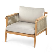 Noble House Sumbawa outdoor club arm chair with woven rattan-style frame and plush cushion for patio seating.
