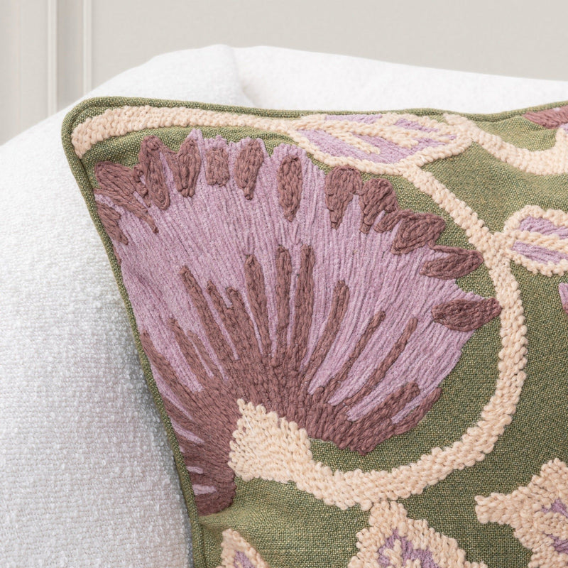 Olive green and multi-colored 22-inch Classic Home Folly accent pillow with a textured fabric design.