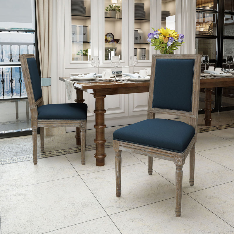 Set of traditional style dining chairs with fabric upholstery by Noble House, showcasing elegant wooden frames and cushioned seats.