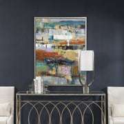 Hand-painted blue Fiesta canvas art by Uttermost, featuring vibrant brushstrokes on a decorative wall hanging.