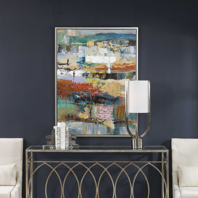 Hand-painted blue Fiesta canvas art by Uttermost, featuring vibrant brushstrokes on a decorative wall hanging.