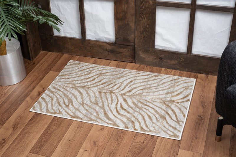 Elegance - 5'3" X 7'3" Area Rug - Gold - R&R Furniture Gallery (Fountain Valley, CA)