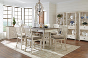 Set of two beige upholstered barstools by Signature Design Ashley, featuring padded seats and sleek wooden legs for modern dining spaces.