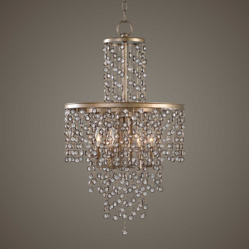 Uttermost Valka 6-light crystal chandelier with light brown finish, featuring elegant hanging crystal accents and a modern design.