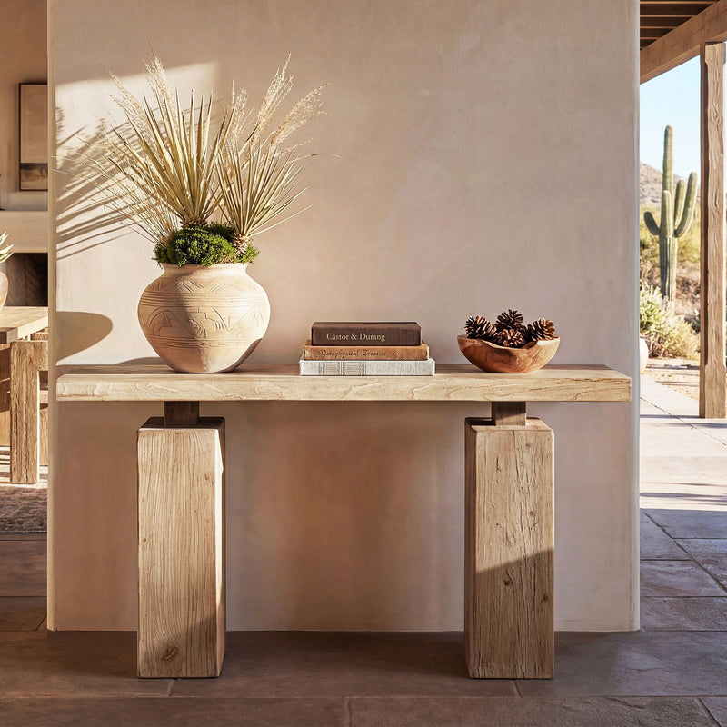 Jennifer Taylor Home Calder console table in natural wood finish, showcasing sleek design and sturdy construction.