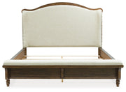 Benchcraft Sturlayne 6-piece panel bedroom set with bed frame, nightstands, dresser, and mirror in a modern bedroom style.