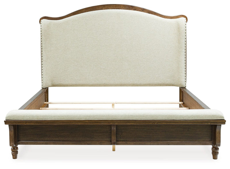 Benchcraft Sturlayne 6-piece panel bedroom set with bed frame, nightstands, dresser, and mirror in a modern bedroom style.