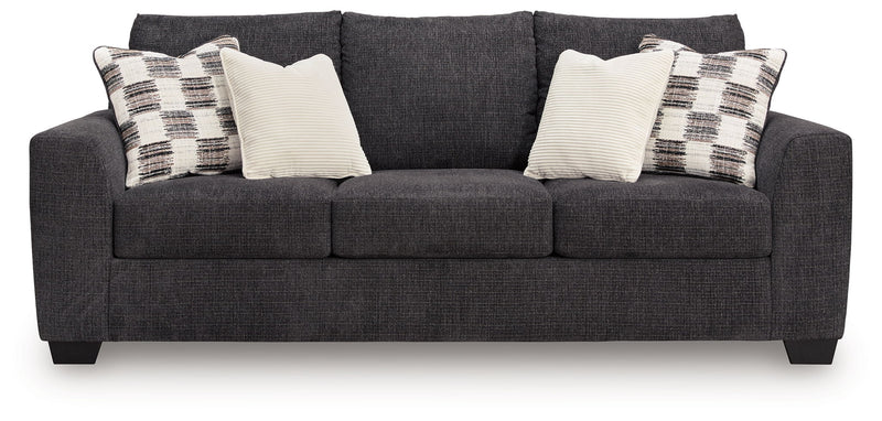 Loreo sofa sleeper by Benchcraft® featuring a modern design with plush fabric, convertible into a bed for versatile seating and sleeping.