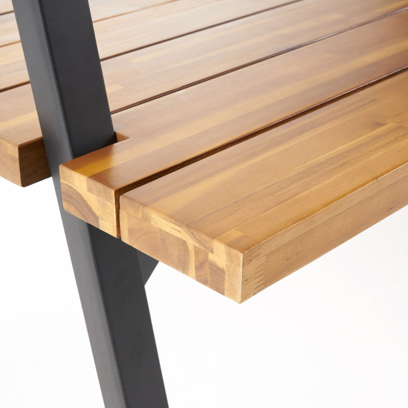 Noble House Huckleberry outdoor dining table with acacia wood surface and built-in plant hanger, teak finish, for outdoor patios.
