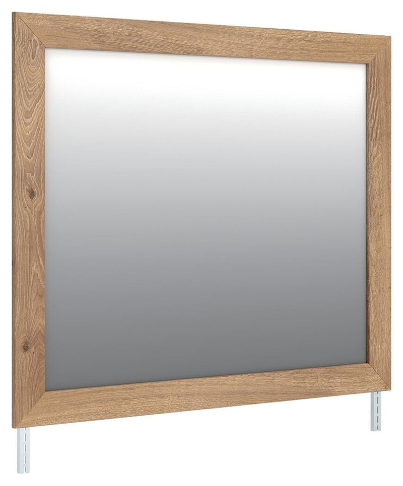 Benchcraft Brozmont bedroom mirror with a tan frame, showcasing a rectangular design perfect for modern bedroom decor.