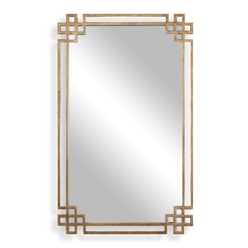 Uttermost Devoll wall mirror with an antique gold finish, featuring a stylish, decorative frame perfect for modern or classic interiors.