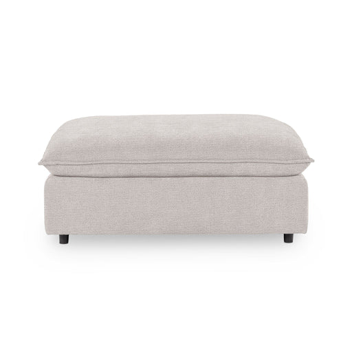 Classic Home Caplan upholstered ottoman with a cushioned top and wooden legs, ideal for living room or bedroom decor.