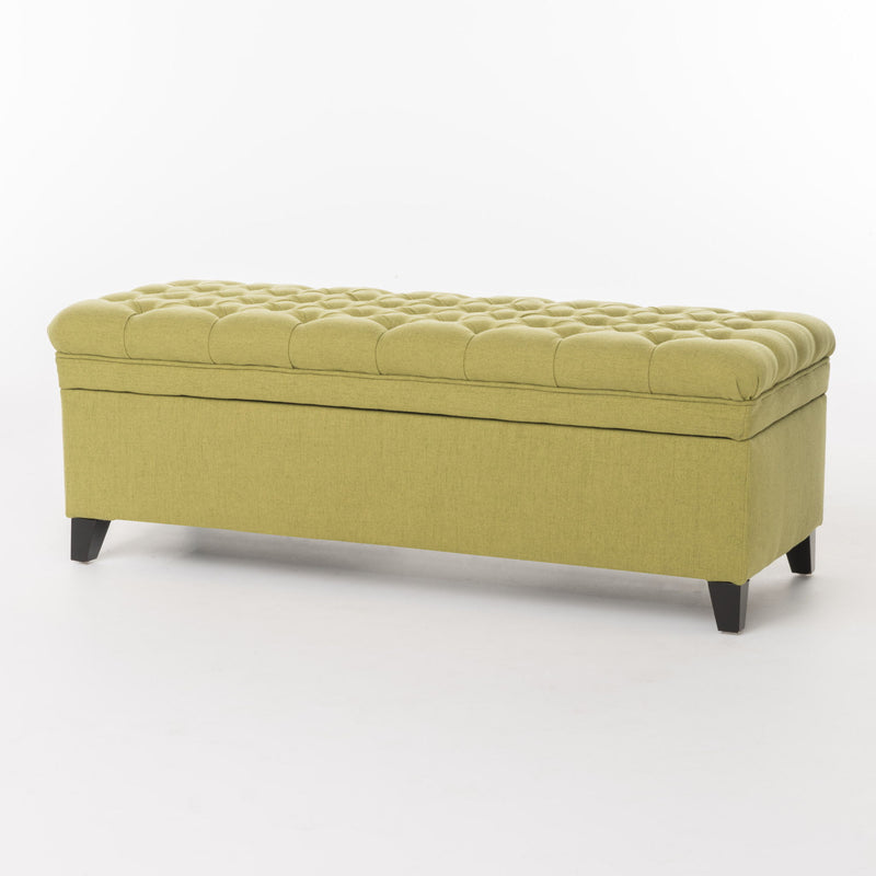 Noble House Juliana storage ottoman with birch wood legs, upholstered in neutral fabric, serving as a versatile seating and storage piece.