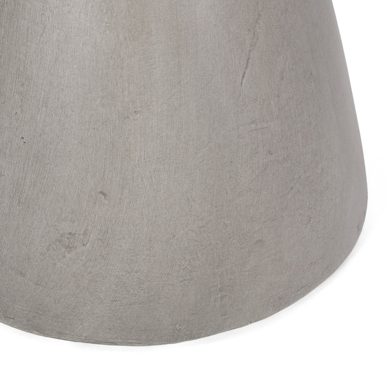 Lightweight concrete side table from Noble House suitable for outdoor and indoor use, with a sleek modern design.
