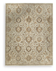 Signature Design by Ashley Sableridge area rug with intricate geometric patterns in neutral tones.