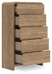 Warm natural brown five-drawer accent chest from Signature Design by Ashley® with sleek wood finish and modern design.