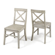 Set of two Noble House Plethora dining chairs with X-shaped backrests, featuring a modern design and comfortable seating.